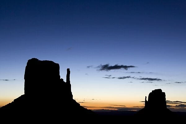 USA - West Mitten Butte (on the left) and East Mitten Butte, the two most prominent and photogenic landmarks of the Monument Valley, the classic Wild-West landscape of sandstone buttes