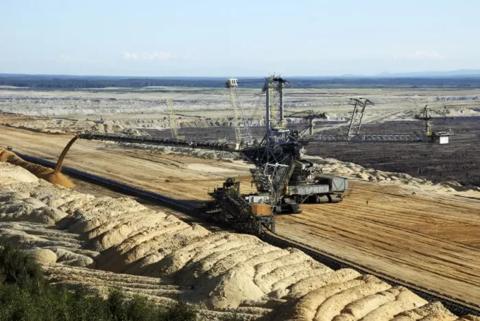 Framed Print : Vattenfall Europe Opencast brown coal (lignite) mine and simultaneous backfilling - near Weisswasser - Saxony NE Germany. (note the man for size behind the big excavator) Framed Print : Vattenfall Europe Opencast brown coal (lignite) mine and simultaneous backfilling - near Weisswasser - Saxony NE Germany. (note the man for size behind the big excavator)