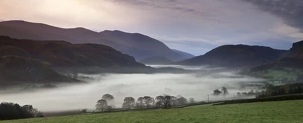 View from Castlerigg Stone Circle looking down the mist covered valley - November - Keswick - Lake District - England