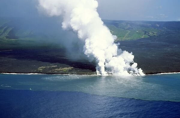 Volcano - Larva flowing from Kilauea and entering the sea. Hawaii - USA