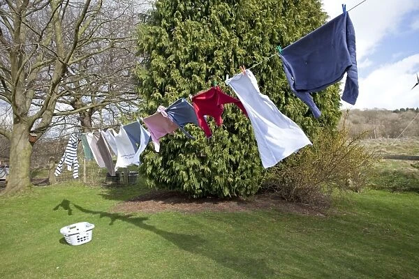 Washing line with clothes drying in the wind Cotswolds UK