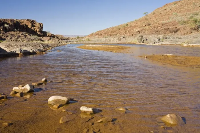 Framed Print : Water in the Desert Precious water near Palmwag Damaraland, Namibia, Africa Framed Print : Water in the Desert Precious water near Palmwag Damaraland, Namibia, Africa