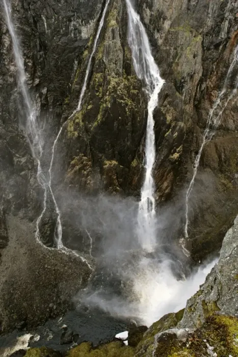 Framed Print : waterfalls view into deep gorge towards the thundering water masses of Voringfossen in early spring Voringfossen, Hardangervidda, Fjord-Norway, Norway