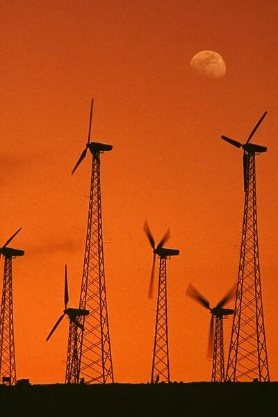 Wind turbines - at sunset, generating electricity at a windmill farm. California, USA S2564