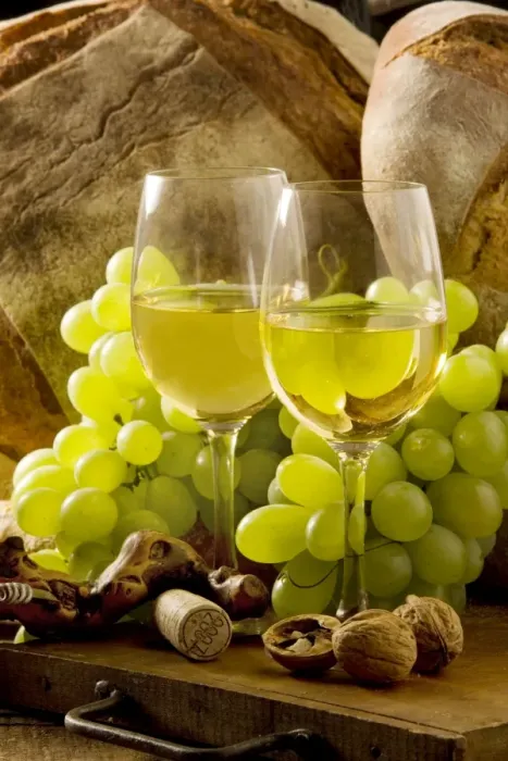 Framed Print : Wine Glasses - with white wine and grapes Framed Print : Wine Glasses - with white wine and grapes