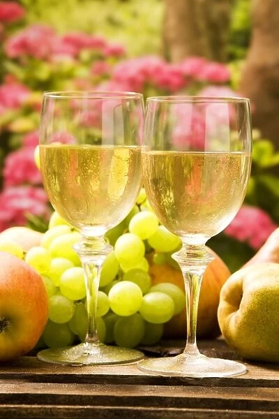Wine Glasses - with white wine and grapes