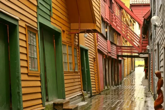 Framed Print : wooden houses alley and colourful historic trade houses in UNESCO world heritage site of Bryggen Bergen, Norway Framed Print : wooden houses alley and colourful historic trade houses in UNESCO world heritage site of Bryggen Bergen, Norway