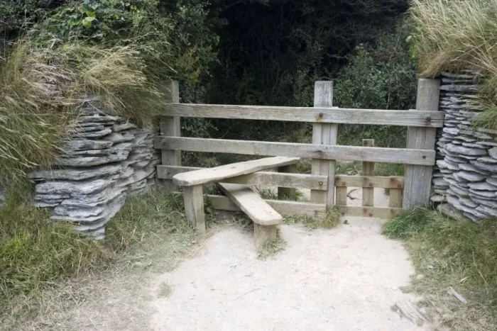Framed Print : Wooden stile with dog gate between stone walls on cliff path North Devon UK Framed Print : Wooden stile with dog gate between stone walls on cliff path North Devon UK
