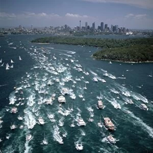 Aerial - Sydney to Hobart yacht race sailing out of Sydney Harbour - Australia JPF52403