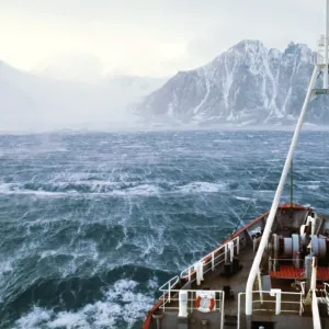Antarctic - high wind from glacier over sea Antarctic - high wind from glacier over sea