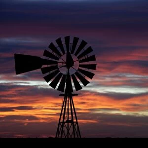 Argentina, Patagonia, Province Chubut Windmill on the steppe, at sunset. Valdes Peninsula