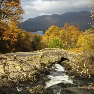 Ashness Bridge in autumn looking towards Derwent Water and the mountains of Skiddaw - Lake District - England Ashness Bridge in autumn looking towards Derwent Water and the mountains of Skiddaw - Lake District - England