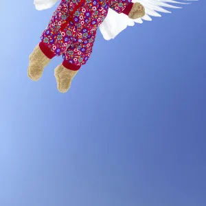 Baby girl with wings, flying angel. model released