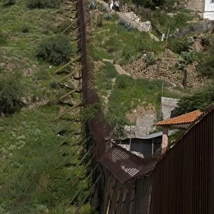 Border fence between Nogales Sonora Mexico (right) and Nogales Arizona USA