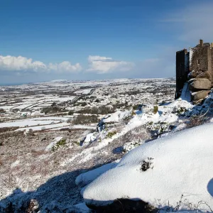 Carn Brea castle - in snow - looking east to Redruth and beyond - Cornwall - UK