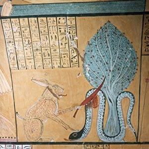 Egypt XIX Dynasty ( 1300 BC ) wall painting from the tomb of Sennedjem shows the God Ra in the form of a cat slaying the snake Apophis who was the most feared & hated embodiment of evil & darkness