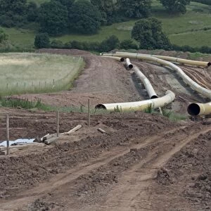 Laying new natural liquified gas pipeline through open countryside from Milford Haven to Tirley near Holm Lacy Ross Gloucestershire UK