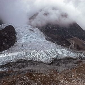 Nepal - Base of Langtang glacier in descending cloud Langtang National Park Nepal