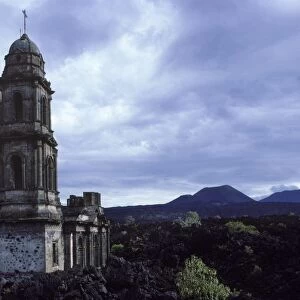 Paricutin volcano, Mexico - State of Michoacan Paricutin volcano is the cone visible in the distance. The lava flows buried the village, only the church tower and part of the facade were left standing