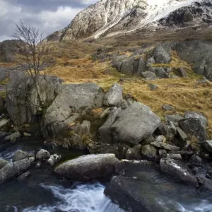 River Idwal with Tryfan covered in snow - March - Ogwen Valley - Snowdonia - Gwynedd - North Wales - UK River Idwal with Tryfan covered in snow - March - Ogwen Valley - Snowdonia - Gwynedd - North Wales - UK