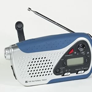 Small windup clockwork dual band radio with with in torchlight and battery options UK