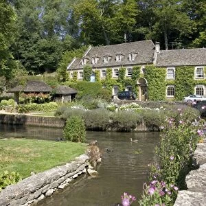 Swan Hotel by River Coln at Bibury, Cotswolds, UK