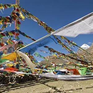 Tibet Sacred Mt Kailash and prayer flags - (Pilgrims walk the kora 52km around the mountains base)