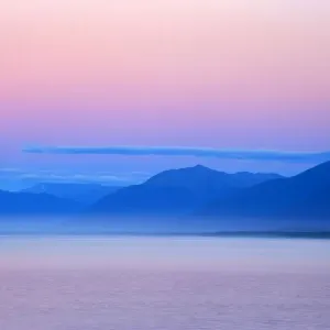Twilight ocean and mountains around Jackson Bay at twilight after sunset Jackson Bay, Haast, South Island, New Zealand Twilight ocean and mountains around Jackson Bay at twilight after sunset Jackson Bay, Haast, South Island, New Zealand