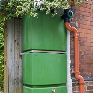 Water Tank - Large green rectangular plastic water storage tank collecting rainwater from roof Cheltenham UK