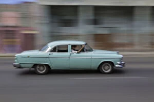 1950s era car in motion, Havana, Cuba