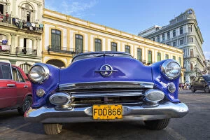 1950s era car parked on street in Havana