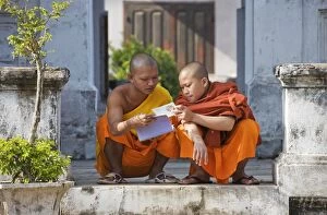 Images Dated 25th November 2007: 2 Buddhist novices at leisure in the Buddhist monastery