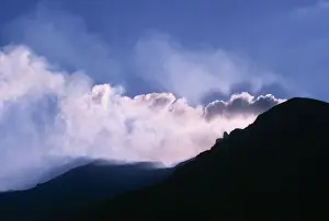 Smoke Prints: Aeolian Island Stromboli, smoke issuing from the volcano at dusk