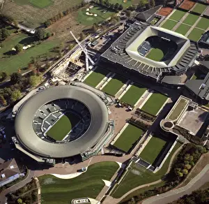Aerial image of London, England, UK: All-England Club (All England Lawn Tennis and Croquet Club), Wimbledon Centre court and number one court, West London