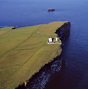 Seashore Prints: Aerial image of Scotland, UK: Lighthouse at Copinsay, Orkney Mainland