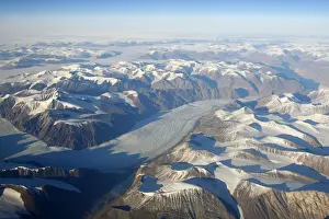 Aerial of mountains & glacier - South East coast of Greenland