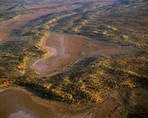 Aerial - Playas / claypans and low dunes the most vegetated and largest sand dune desert in Australia. Maralinga-Tjarutja Aboriginal lands - Near Lake Meramangye, Great Victoria Desert, South Australia JPF47860