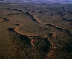 Aerial - Sand dunes near Ayers Rock / Uluru Uluru-Kata Tjuta National Park (World Heritage Area), Northern Territory, Australia JPF52844
