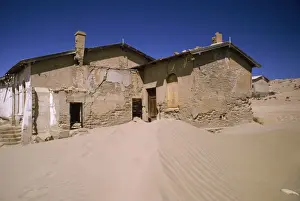Encroachment Prints: Africa - desert encroachment. Derelict diamond mining town. Kolmanskop, Namib Desert