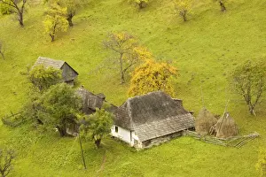 East Europe Prints: Ancient farm in a beautiful pastoral montane landscape