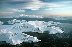 Antarctica - aerial view of West side of Arctowsky Peninsula, Danco Coast - San Martin Land with Gerlache Strait and Ambers Island in background AU-861