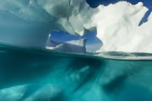 Antarctica, Underwater view of arched Iceberg