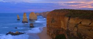 Twelve Apostles sunset - sandstone rock formations of famous Twelve Apostels, which are sculpted by the relentless sea