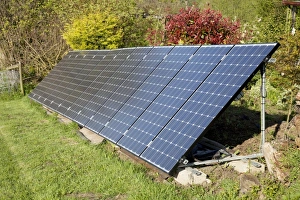 Images Dated 20th April 2009: Array of solar PV photovolataic panels mounted on steel frame in field - Cotswolds UK