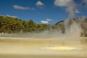 Artist's Palette the wide range of colours of this area stem from overflowing water of the adjoining Champagne Pool. As the water cools and the minerals are exposed to our atmosphere they show themselves in a variety of colours