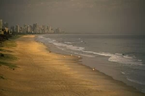 Behind Gallery: Australia - Walkers on Mermaid Beach at dawn with