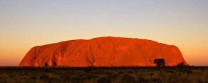 Images Dated 29th May 2008: Ayers Rock - Uluru - brightly ablaze Ayers Rock shortly at sunset