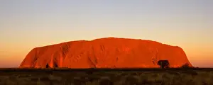 Sunsets And Sunrise Prints: Ayers Rock - Uluru - brightly ablaze Ayers Rock shortly at sunset - Uluru-Kata Tjuta National Park