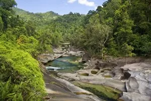 Babinda creek - this river flows picturescquely over hugh boulders down a narrow gorge within lush tropical rainforest