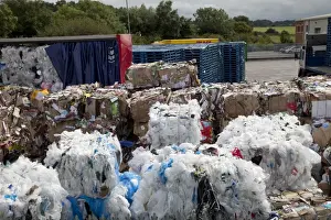 Recycling Prints: Bales of plastic and cardboard waste for recycling outside Morrisons warehouse Bristol UK